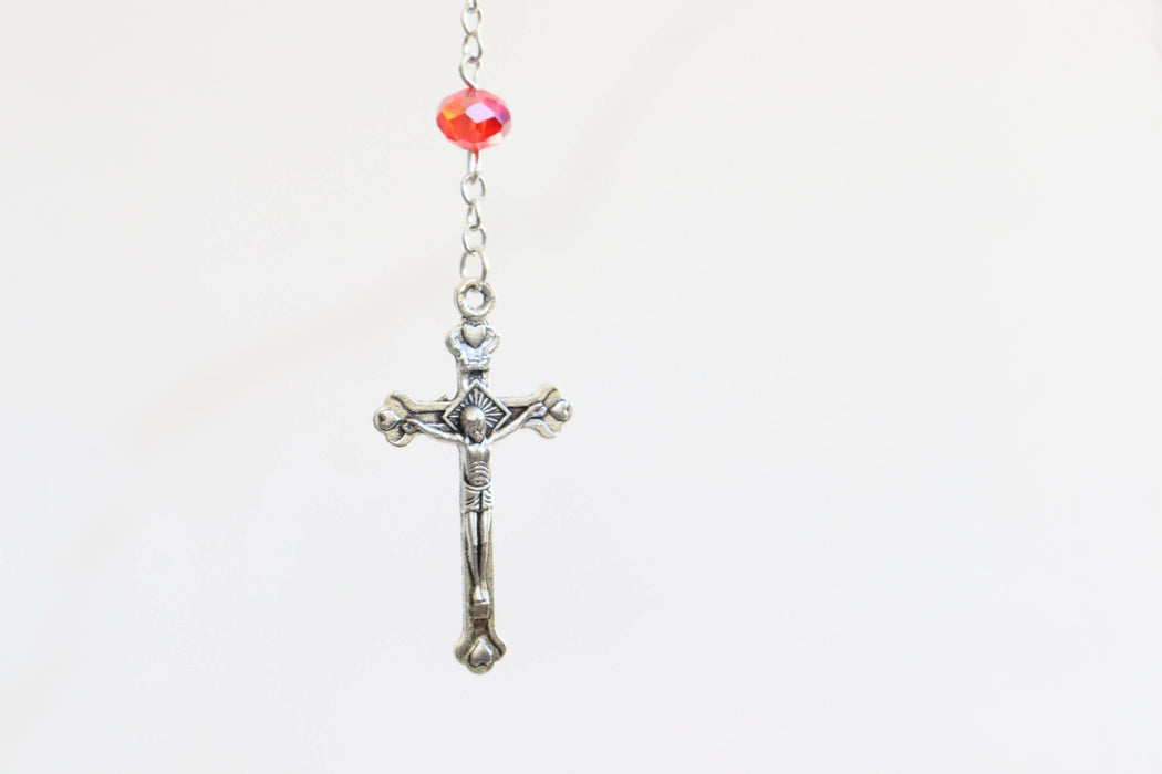 cross necklace with red crystal beads