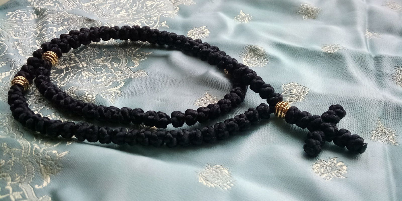 100-Knot Handmade Prayer Rope Nylon Cord in black with gold details
